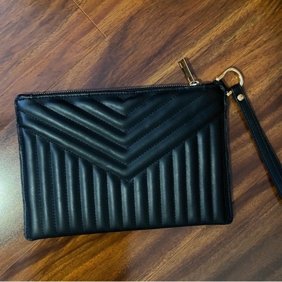 a new day Handbags - Elegant Black Quilted foam Clutch like new  9”x7”